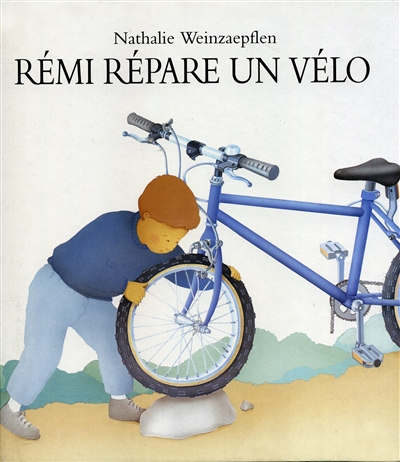 Rémi répare un vélo
