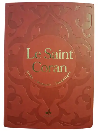 Le saint Coran : et la traduction en langue française du sens de ses versets, et la transcription en caractères latins, en phonétique : couverture daim rouge Le saint Coran : et la traduction en langue française du sens de ses versets, et la transcription en caractères latins, en phonétique : couverture daim rouge