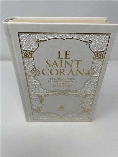 Le saint Coran : et la traduction en langue française du sens de ses versets : couverture daim blanc