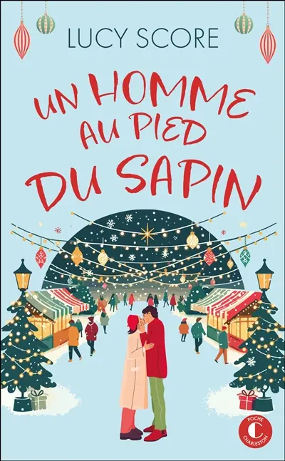 Un homme au pied du sapin