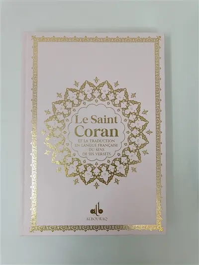 Le saint Coran : et la traduction en langue française du sens de ses versets : couverture rose clair et tranches arc-en-ciel