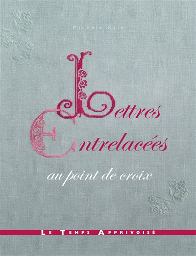 Lettres entrelacées au point de croix