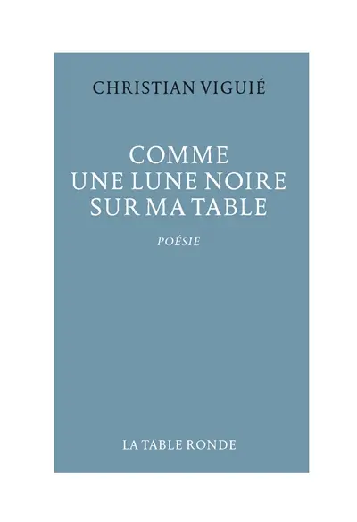 Comme une lune noire sur ma table