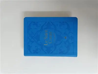 Le saint Coran : et la traduction en langue française du sens de ses versets : couverture tissu bleu gris