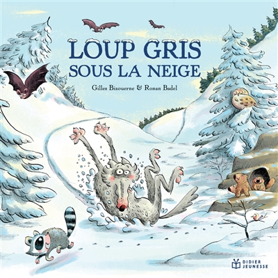 Loup gris sous la neige