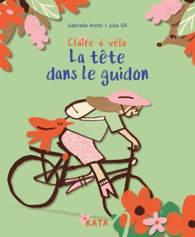 Claire à vélo. La tête dans le guidon