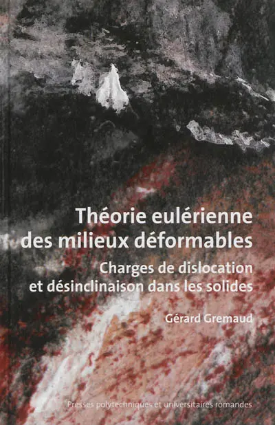 Théorie eulérienne des milieux déformables : charges de dislocation et désinclinaison dans les solides