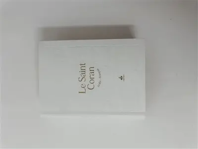 Le saint Coran et la traduction en langue française du sens de ses versets : couverture daim blanc