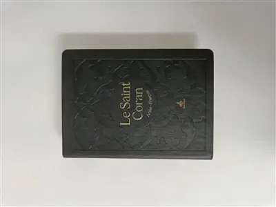 Le saint Coran : et la traduction en langue française du sens de ses versets : couverture tissu noir